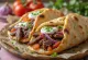 Pita gyros me mish viçi dhe xaxiq të freskët